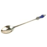 LIBERTY & CO., A RARE GEORGE V PERIOD HALLMARKED SILVER PRESENTATION AMPUTEE SPOON Having a blue