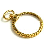 CHANEL, A VINTAGE YELLOW METAL MAGNIFYING GLASS Rope twist design, monogrammed.. (approx 4cm)