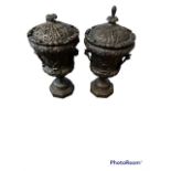 A PAIR OF LARGE HEAVILY CARVED AND DECORATED CLASSICAL STYLE CAMPAGNA WOODEN URNS AND LIDS On