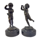 A PAIR OF 19TH CENTURY CONTINENTAL BRONZE PATINATED MODELS, BACCHANALIAN DANCING CHERUBS Raised on