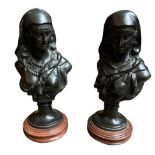 TWO BRONZE DESK BUSTS ROMAN MAIDENS On circular wooden bases Condition good throughout 36cm