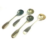 A COLLECTION OF EARLY 19TH CENTURY SILVER MUSTARD SPOONS Having engraved family crest, to include