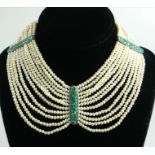 SALLY DUDMESH, A VINTAGE SILVER,TURQUOISE AND PEARL CHOKER NECKLACE Eleven strands of pearls with