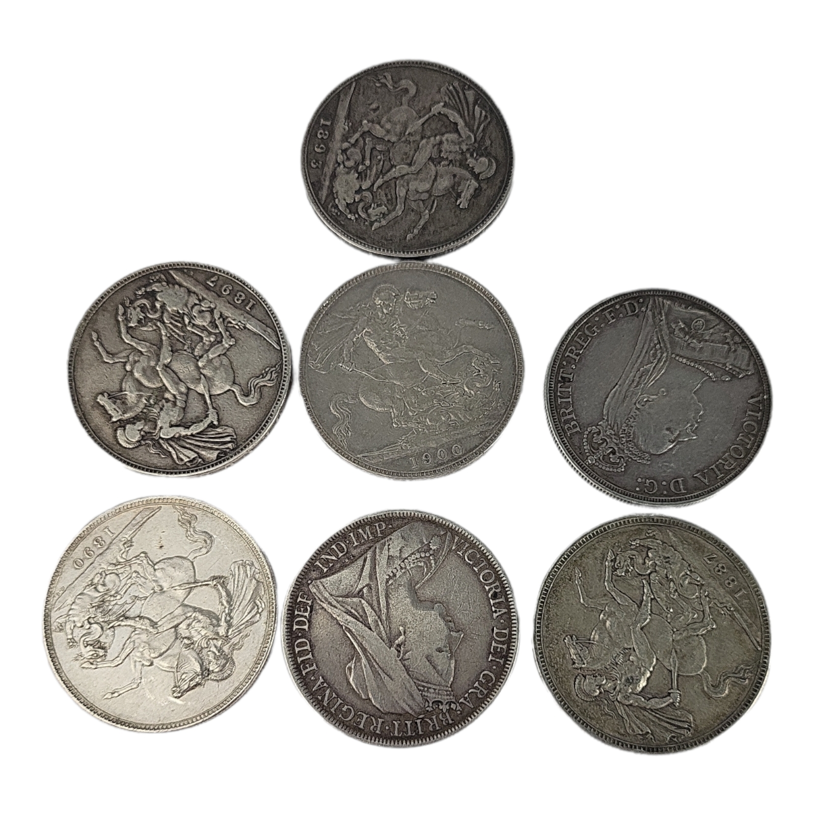 A COLLECTION OF SEVEN VICTORIAN SILVER FULL CROWN COINS Comprising two dated 1887, 1893, 1897,
