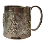 AN EARLY 20TH CENTURY INDIAN SILVER TANKARD Single handle with embossed figural decoration within