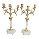 A PAIR OF FINE 19TH CENTURY EMPIRE STYLE GILDED METAL AND ORMOLU FOUR LIGHT TABLE CANDELABRAS Cast