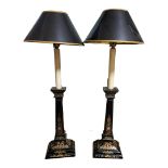 A PAIR OF 20TH CENTURY VICTORIAN STYLE EBONISED AND LACQUERED TABLE LAMPS Both painted with