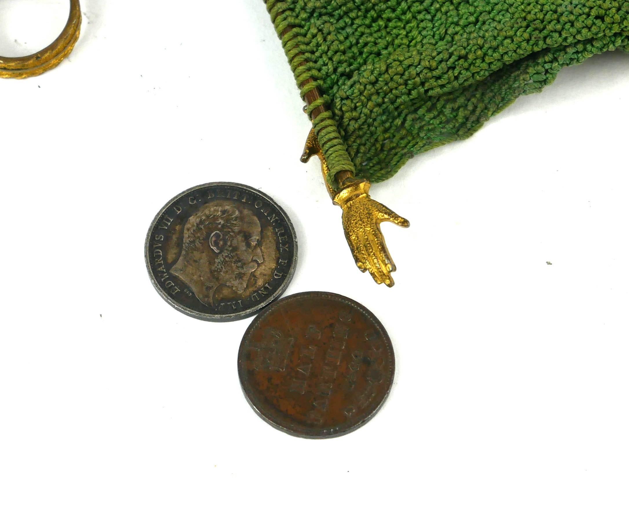 A 19TH CENTURY GILT METAL MISER'S PURSE Set with two pairs of hands and ring seal on green fabric - Image 2 of 6