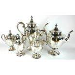 PIESNER, AN EARLY 20TH AMERICAN FIVE PIECE STERLING SILVER TEA SET Classical urn form comprising a