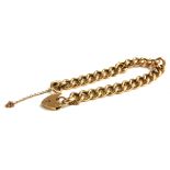AN EARLY 20TH CENTURY 9CT GOLD BRACELET A rose gold chain with yellow gold padlock clasp. (approx