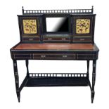 A 19TH CENTURY AESTHETIC MOVEMENT EBONISED WRITING DESK With spindle gallery above a central