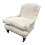 AN EDWARDIAN PARLOUR ARMCHAIR In cream fabric upholstery with button back arms, complete with