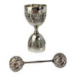 AN EARLY 20TH CENTURY INDIAN SILVER DOUBLE EGG CUP Having embossed figural decoration within