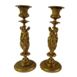 A PAIR OF FINE 19TH CENTURY CONTINENTAL GILDED BRONZE FIGURAL CANDLESTICKS Each column cast with