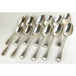 A SET OF TWELVE GEORGIAN SILVER TABLESPOONS Having a beaded edge design, hallmarked London, 1811 and