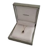 A VINTAGE 9CT GOLD AND GARNET PENDANT NECKLACE. (approx weight just under 1g, pendant length 0.