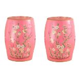 A PAIR OF CHINESE CERAMIC PINK BARREL GARDEN SEATS Decorated with birds and flowers. (h 46cm x