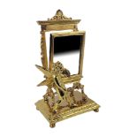 A GILT BRONZE TABLE TOP VANITY MIRROR With a cherub crest. (h 24cm) Condition: good