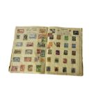 A VINTAGE WORLD POSTAGE STAMP ALBUM To include Argentina to Virgin Islands and Great Britain penny