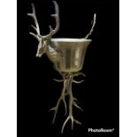 A LARGE SILVER PLATED STAG COOLER ON STAND On an antler base. (h 84cm x diameter 39cm) Condition: AF