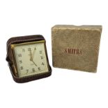 AN EARLY 1950'S SMITHS OF CRICKLEWOOD EIGHT DAY TIMEPIECE TRAVELLING ALARM CLOCK 7 jewels, with