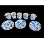 A SET OF FIVE LATE 19TH CENTURY GERMAN BLUE AND WHITE PORCELAIN COFFEE CANS AND SAUCERS Hand painted