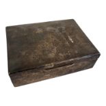 A LARGE EARLY 20TH CENTURY STERLING SILVER RECTANGULAR CIGARETTE BOX With wooden interior,