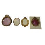 A SET OF FOUR LATE 19TH CENTURY CONTINENTAL GILT METAL HIGHLY ORNATE PHOTOGRAPH FRAME Two oval and