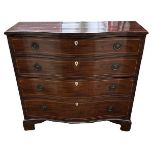A GEORGIAN MAHOGANY SERPENTINE FRONTED CHEST OF FOUR LONG GRADUATING DRAWERS Fitted with brass