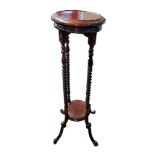 A 19TH CENTURY DESIGN MAHOGANY PLANT STAND On barley supports, along with a basket jardinière. (