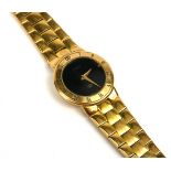 GUCCI, A VINTAGE GOLD PLATED LADIES' WRISTWATCH The circular black dial with integral bracelet,