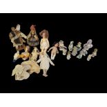 A COLLECTION OF LATE 19TH CENTURY AND LATER BISQUE DOLLS AND PORCELAIN PIN DOLLS To include