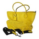 COACH, NEW YORK, A VINTAGE YELLOW LEATHER HOLDALL Twin carry handles and shoulder strap. (approx