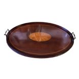 AN EDWARDIAN MAHOGANY AND MARQUETRY INLAID OVAL BUTLER'S TRAY With twin handles and satinwood inlaid
