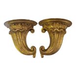 A PAIR OF EARLY 20TH CENTURY ITALIAN DESIGN CARVED GILDED WOOD WALL SCONCES In the form of