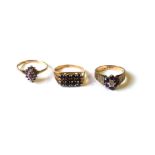 A COLLECTION OF THREE VINTAGE 9CT GOLD AND GEM SET RINGS Comprising a sapphire with two rows of