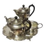 A VINTAGE SILVER PLATE FOUR PIECE TEA SERVICE ON TRAY Consisting of a teapot, hot water pot, sugar