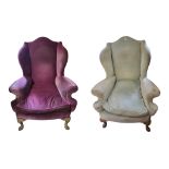 A PAIR OF GEORGIAN DESIGN MAUVE AND BLUE VELVET UPHOLSTERED WING ARMCHAIRS On carved cabriole