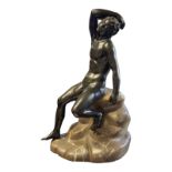 AFTER THE ANTIQUE, A 19TH CENTURY BRONZE STATUE, HERMES SEATED ON A POLISHED ROCK From the