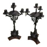 A PAIR OF 19TH CENTURY CONTINENTAL EMPIRE STYLE FOUR LIGHT TABLE CANDELABRAS Cast with scrolling