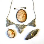 A COLLECTION OF EARLY 20TH CENTURY SILVER AND MARCASITE JEWELLERY Comprising a carved shell form