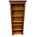 A REGENCY DESIGN MAHOGANY AND MARQUETRY INLAID OPEN BOOKCASE. (76cm x 32cm x 182cm) Condition: