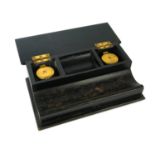 A LATE VICTORIAN EBONISED TWO SECTION INKSTAND With two original matching ink bottles and brass