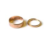 TWO VINTAGE 9CT GOLD WEDDING RINGS To include a wide gent's band of plain form. (gents approx size