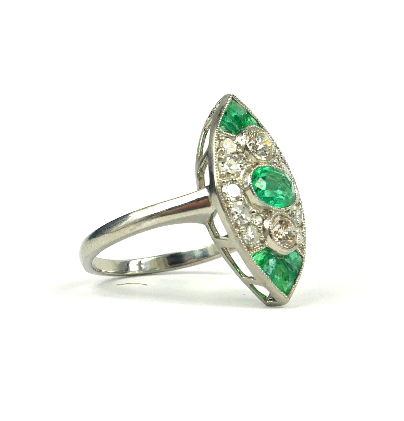 A PLATINUM ART DECO STYLE MARQUISE SHAPED RING SET WITH EMERALDS AND DIAMONDS. (Approx Emeralds 0. - Image 2 of 3