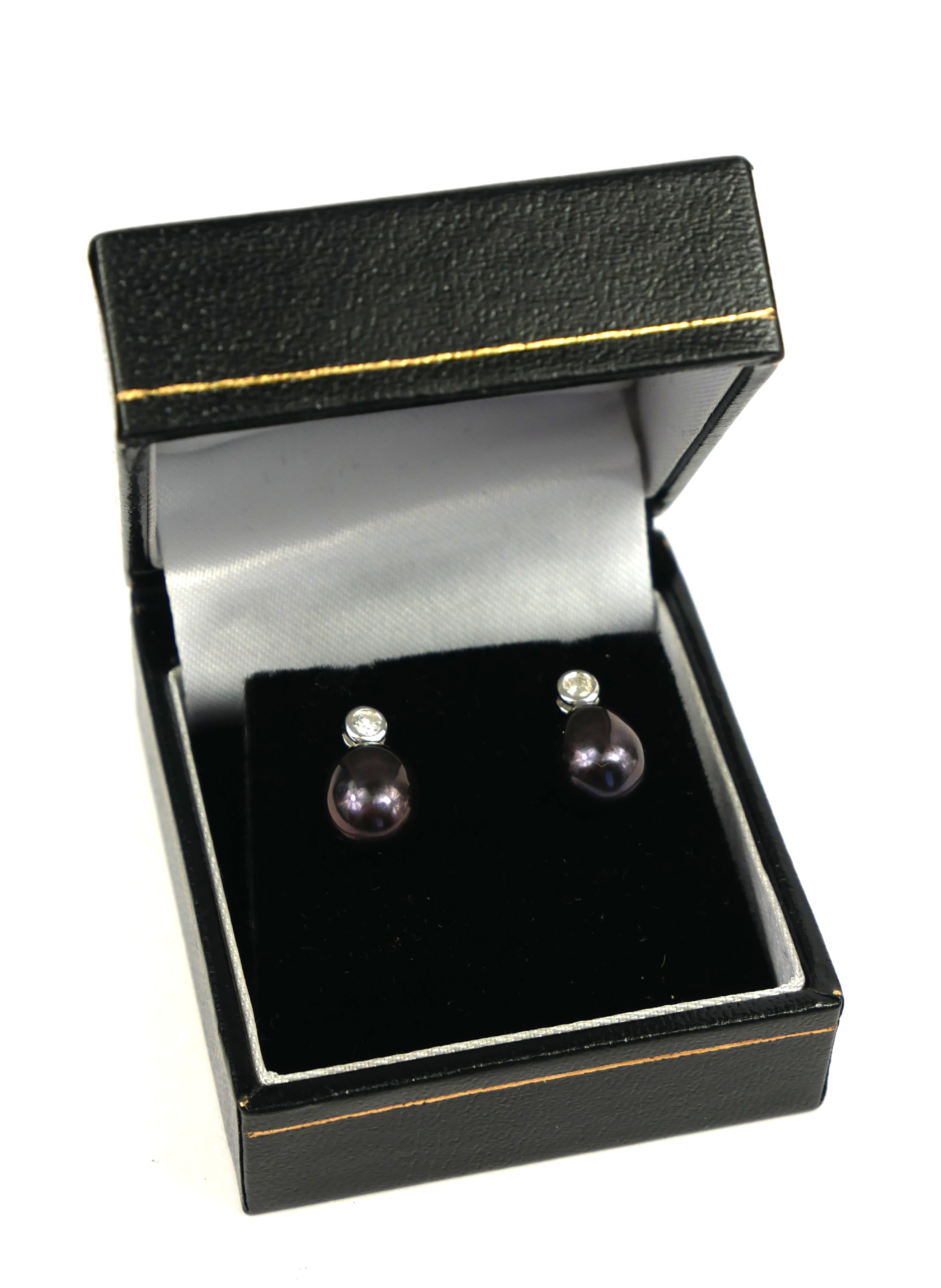 A PAIR OF 9CT WHITE GOLD, BLACK PEARL AND DIAMOND RUBOVER DROP EARRINGS. Boxed - Image 2 of 3