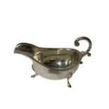 LGS, A SILVER SAUCE BOAT RAISED UPON THREE SPADED FOOT LEGS, LONDON, 1976. (10.3cm x 7.5cm, 219.7g)