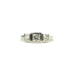 AN 18CT WHITE GOLD GRADUATED PRINCESS CUT DIAMOND TRILOGY RING. (Approx Diamonds 1.60ct)