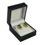 A PAIR OF YELLOW GOLD OVAL PERIDOT AND DIAMOND CLUSTER EARRINGS,Boxed. (Approx Peridot 4.80ct,