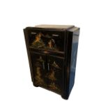 AN ART DECO CHINOISERIE BLACK LACQUERED COCKTAIL CABINET Decorated with Chinese figures in a